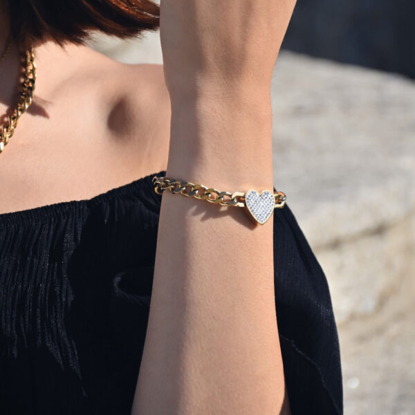 Look Pulseira em aço com fio largo, pendente em forma de coração com brilhantes e aloquete com brilhantes, dourado